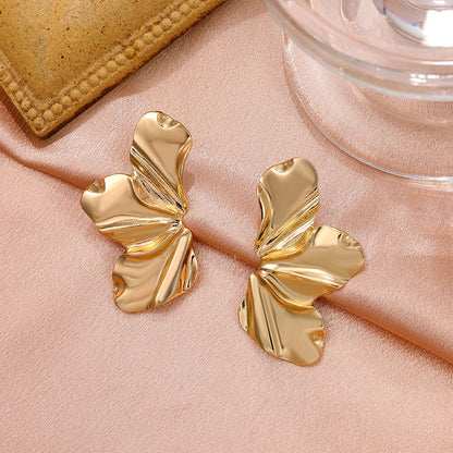 Boucles d'oreilles pétales irréguliers en acier inoxydable
