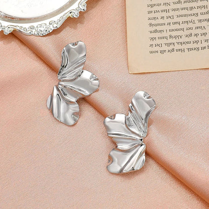 Boucles d'oreilles pétales irréguliers en acier inoxydable